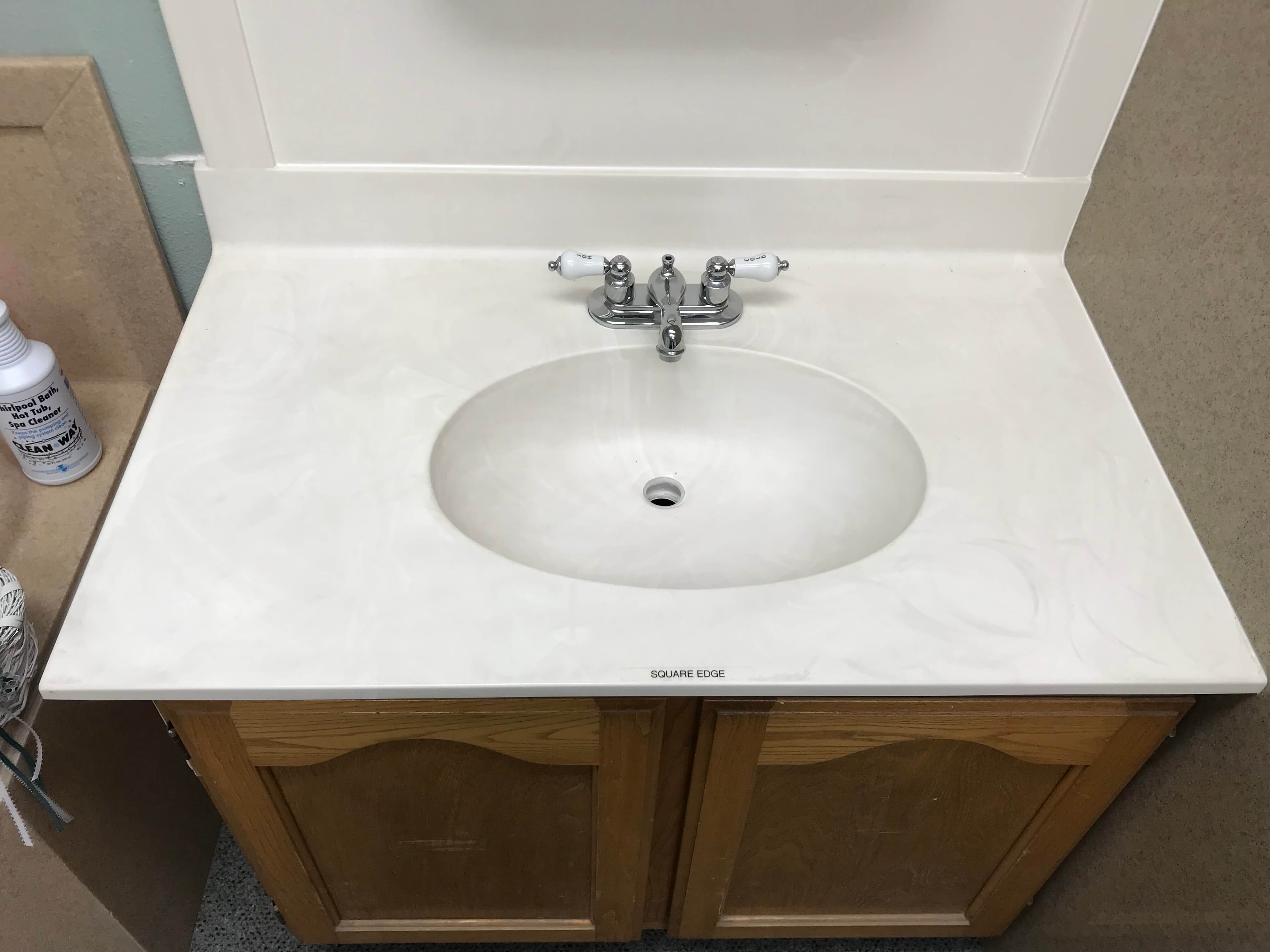 Multiple cultured marble vanity tops in showroom